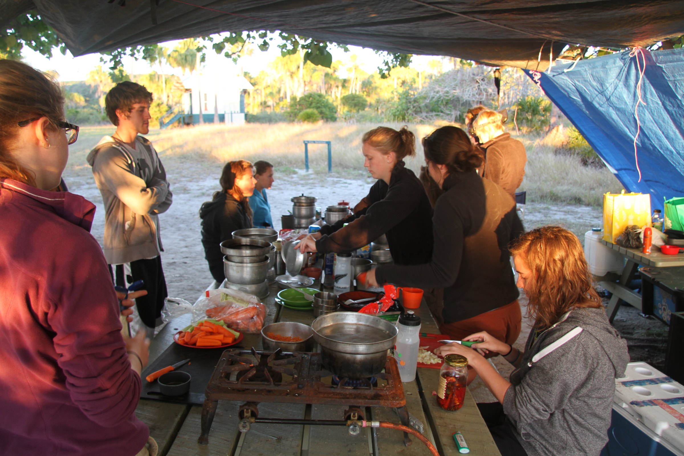 Students gathered for a meal at a campground in Australia
