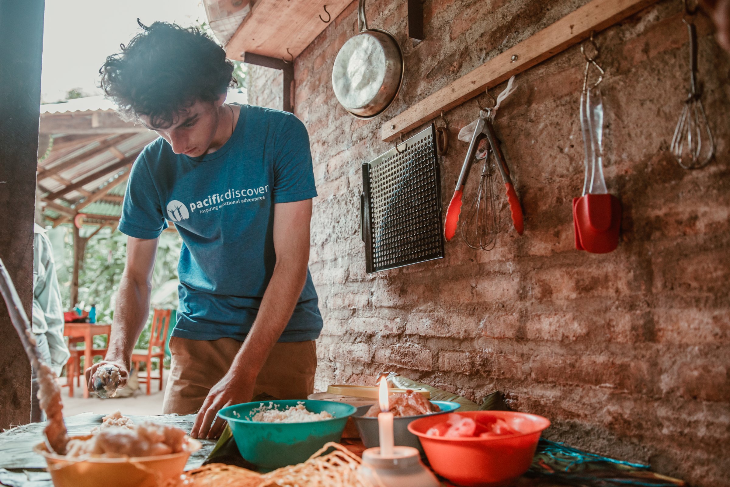 Student cooking at homestay in costa rica