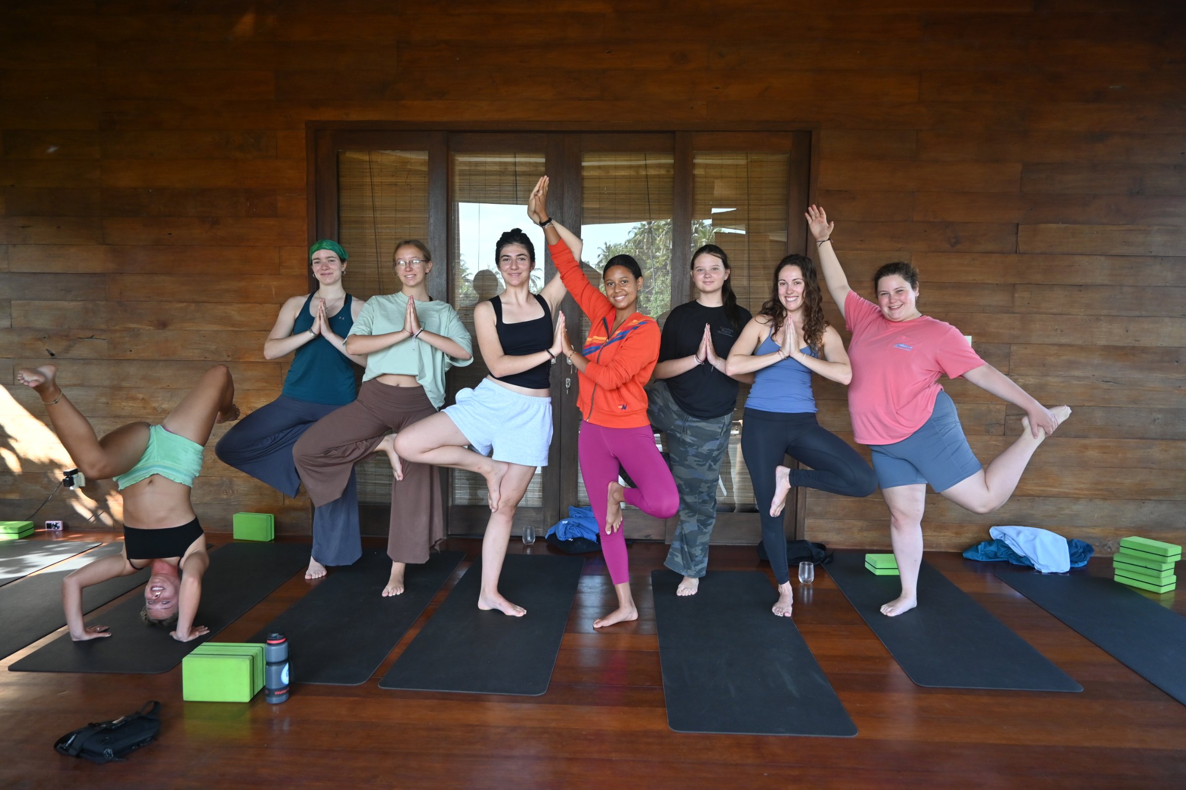 Students doing yoga in Bali